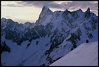 Alpinists go down Aiguille du Midi on a sharp ridge. Alps, France ( color)