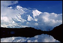 Hiker in the Aiguilles Rouges and Mont-Blanc range, Alps, France. (color)