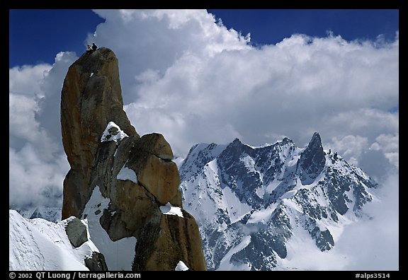 Alpinists on a pinacle of Aiguille du Midi after climbing the South Face. Alps, France