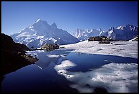 Mountain hut at Lac Blanc and Mont-Blanc range, Alps, France. (color)