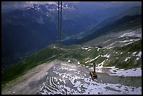 Cable car to Aiguille du Midi, Chamonix Valley in below. Alps, France (color)
