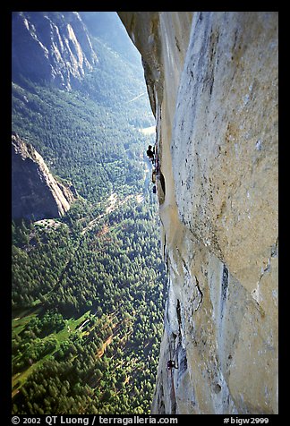 Valerio Folco at the belay, Tom McMillan cleaning the crux pitch. El Capitan, Yosemite, California