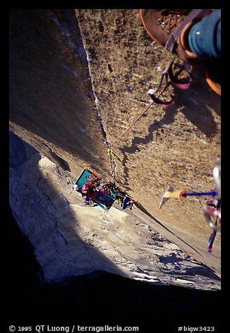 Climbing  the Triple Cracks, the crux of the route. El Capitan, Yosemite, California (color)