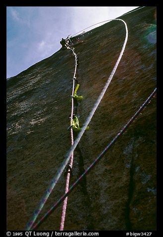 Leading the next pitch, a thin crack in the middle of nowhere. El Capitan, Yosemite, California (color)