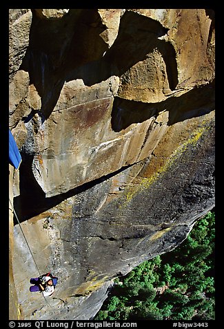 Belaying the steepest (most horizontal) part of the route. Leaning Tower, Yosemite, California (color)