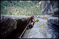 We suffer hauling through a chimney. Washington Column, Yosemite, California ( color)