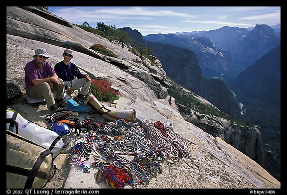 Valerio Folco and Tom McMillan with gear at the top of the wall. El Capitan, Yosemite, California (color)