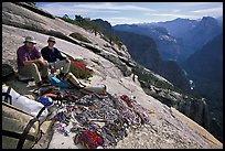 Valerio Folco and Tom McMillan with gear at the top of the wall. El Capitan, Yosemite, California ( color)