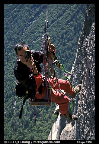 Climbing photographer at work. Yosemite, California