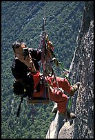 Climbing photographer at work. Yosemite, California