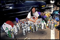 Climber and water bottles needed for an ascent of Mescalito. Yosemite, California (color)