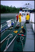 Kayaks loaded on the deck of Glacier Bay Lodge concession boat. Glacier Bay National Park, Alaska (color)