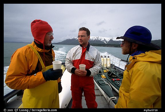 Kayakers in dry suits on the deck of Glacier Bay Lodge concession boat. Glacier Bay National Park, Alaska