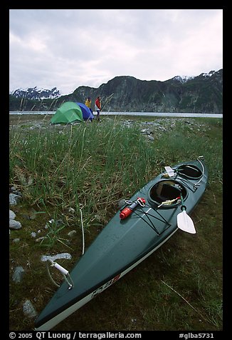 Camp on the flats near McBride Glacier with kayak parked nearby. Glacier Bay National Park, Alaska (color)