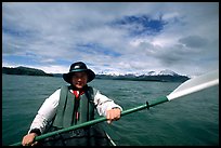 Kayaker paddling in Muir Inlet. Glacier Bay National Park, Alaska