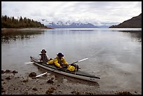 Kayakers land in Hugh Miller Inlet. Glacier Bay National Park, Alaska