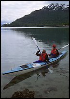 Kayakers in Hugh Miller Inlet. Glacier Bay National Park, Alaska (color)