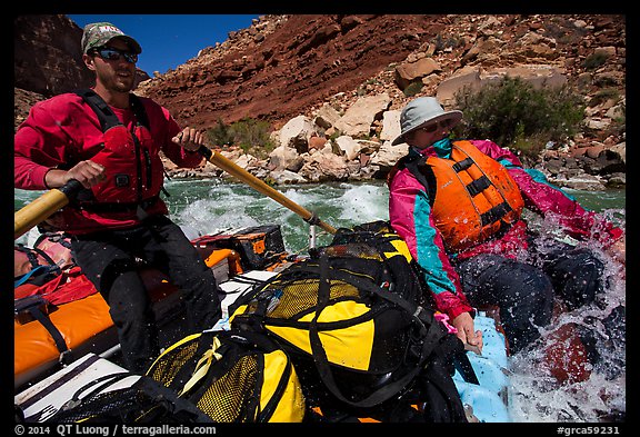 Boatman and passenger splashed in rapid. Grand Canyon National Park, Arizona (color)
