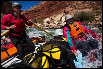 Boatman and passenger splashed in rapid. Grand Canyon National Park, Arizona