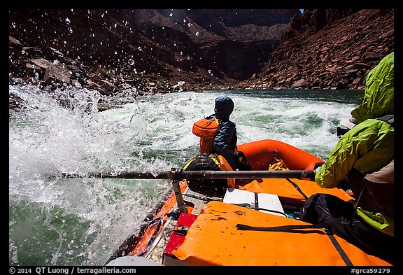 Riding splashy rapids in raft. Grand Canyon National Park, Arizona