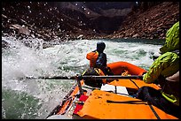 Riding splashy rapids in raft. Grand Canyon National Park, Arizona