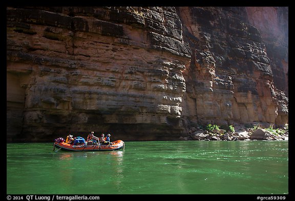 Oar raft on green waters below canyon walls, Marble Canyon. Grand Canyon National Park, Arizona (color)