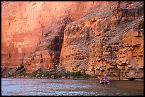 Oar raft below sheet Redwall limestone canyon walls. Grand Canyon National Park, Arizona ( color)