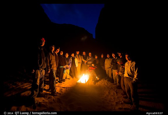 Group by campire at dusk. Grand Canyon National Park, Arizona (color)