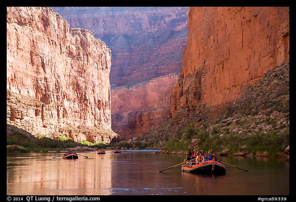 Rafters and towering steep cliffs in  Marble Canyon, early morning. Grand Canyon National Park, Arizona