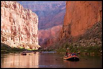 Rafters and towering steep cliffs in  Marble Canyon, early morning. Grand Canyon National Park, Arizona