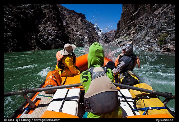 Oar-powered raft hits wave in rapids. Grand Canyon National Park, Arizona