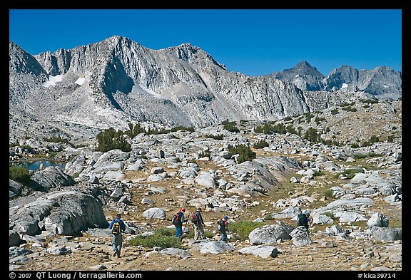 Hikers in Dusy Basin, morning. Kings Canyon National Park, California (color)