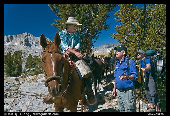 Horseman speaking with hikers, Dusy Basin. Kings Canyon National Park, California (color)