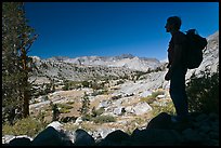 Hiker silhouetted, lower Dusy Basin. Kings Canyon National Park, California