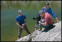 Cameramen filming near lake, lower Dusy Basin. Kings Canyon National Park, California