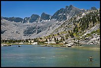 Man bathing in alpine lake, lower Dusy Basin. Kings Canyon National Park, California (color)