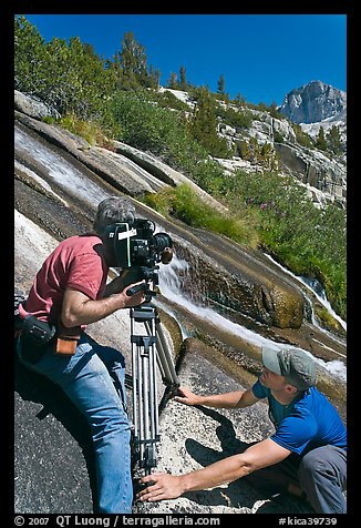 Men filming a waterfall, lower Dusy Basin. Kings Canyon National Park, California