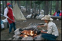 Women preparing food at camp, Le Conte Canyon. Kings Canyon National Park, California (color)