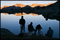 Film crew in action at lake, sunrise, Dusy Basin. Kings Canyon National Park, California (color)