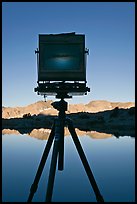 Large format camera with inverted image of mountain landscape on ground glass, Dusy Basin. Kings Canyon National Park, California