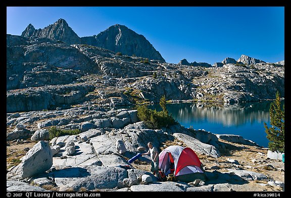 Breaking camp near lake, Dusy Basin. Kings Canyon National Park, California (color)