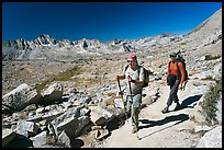 Hikers on trail below Biship Pass, Dusy Basin. Kings Canyon National Park, California (color)