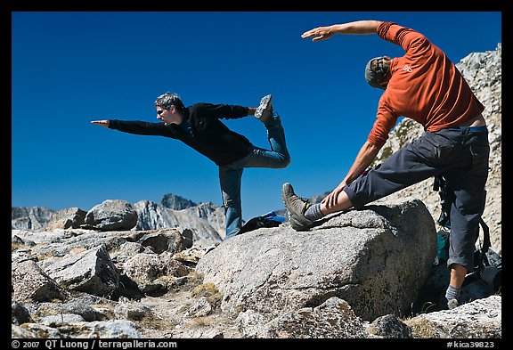 Hikers doing stretching exercises, Bishop Pass. Kings Canyon National Park, California (color)