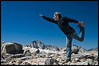 Hiker stretching, Bishop Pass. Kings Canyon National Park, California