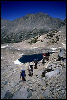 Backpackers near a tarn below Glen Pass, Kings Canyon National Park. California