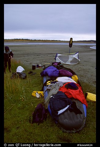 Gear laid out for drying on the bottom of the canoe on a small island of the Kobuk River. Kobuk Valley National Park, Alaska