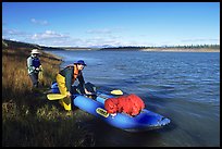 Canoeists prepare to lauch on the Kobuk River. Kobuk Valley National Park, Alaska