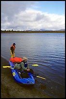 Canoeists ready to lauch with the boat loaded up. Kobuk Valley National Park, Alaska (color)