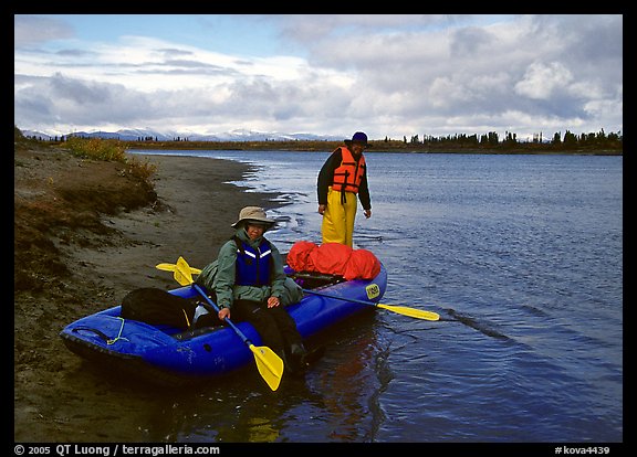 Canoeists ready to lauch with the boat loaded up. Kobuk Valley National Park, Alaska