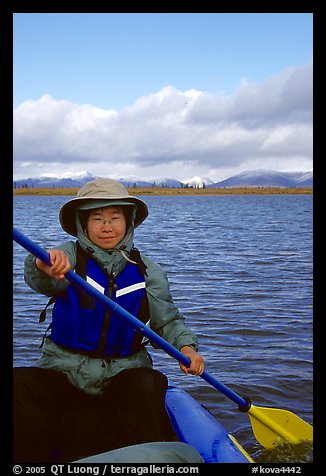 Canoeist Paddling on the Kobuk River. Kobuk Valley National Park, Alaska (color)